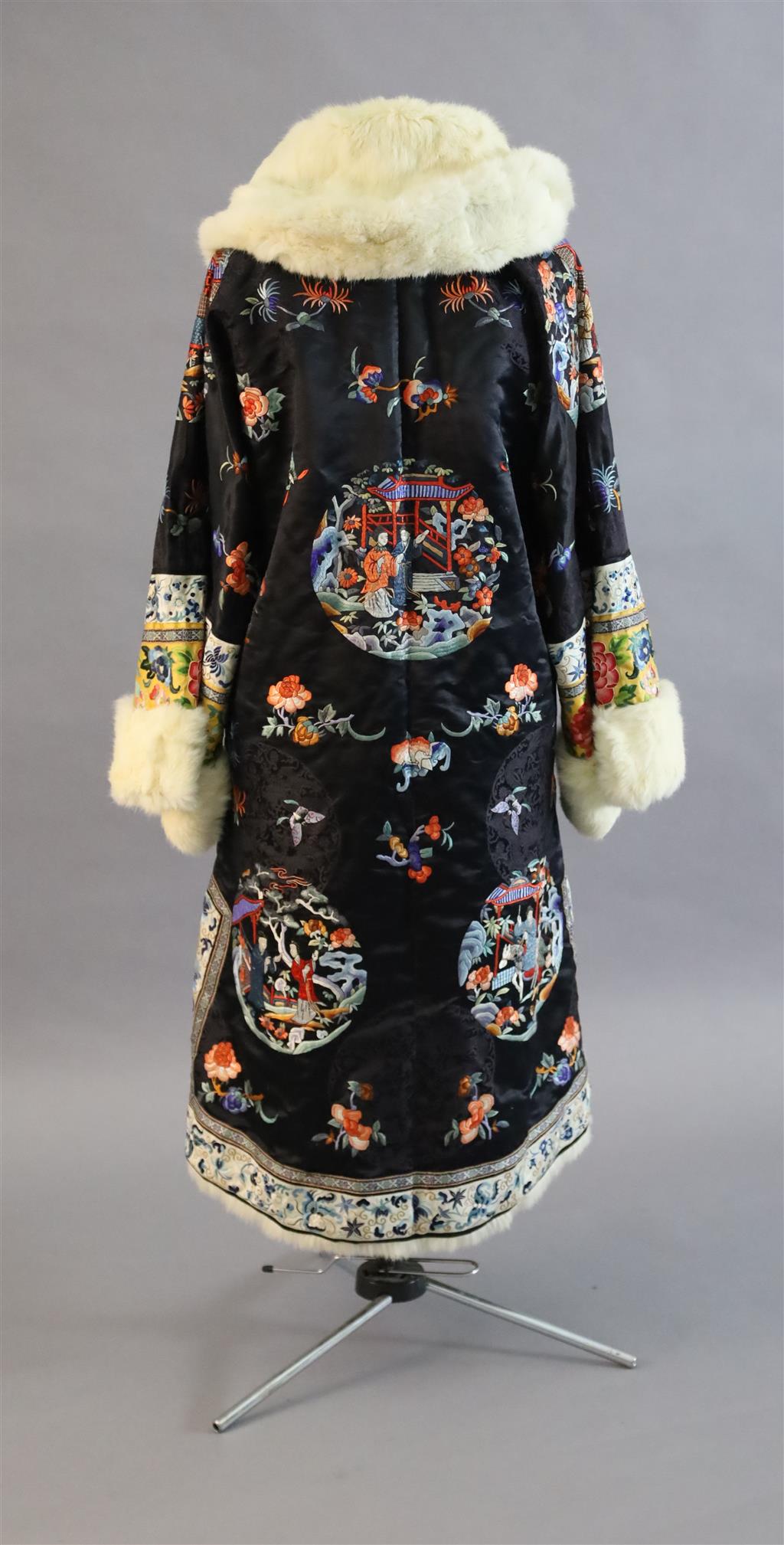 A Chinese silk embroidered winter robe, late 19th century/early 20th century, length 125cm